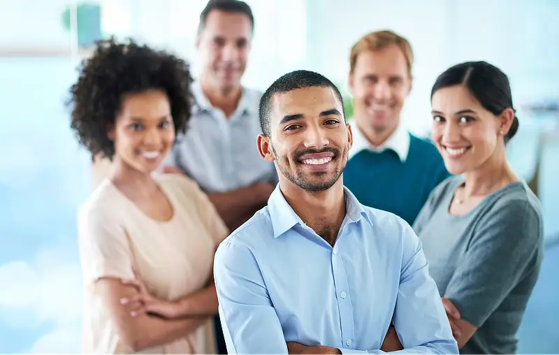 Team of smiling support professionals